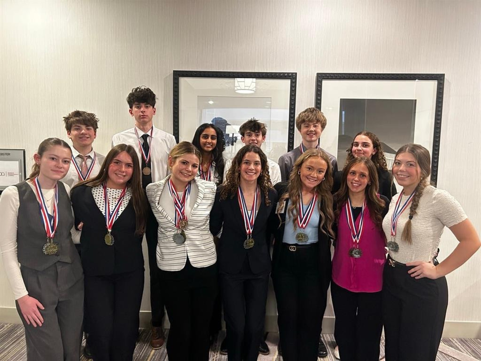 A group photo of the 13 LCHS BPA students who competed in the regional competition and have qualified for the state competition.