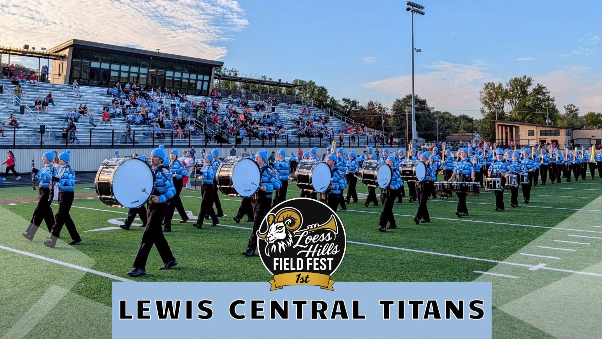 The LCHS marching band on the field with their instruments at the Loess Hills Field Fest.
