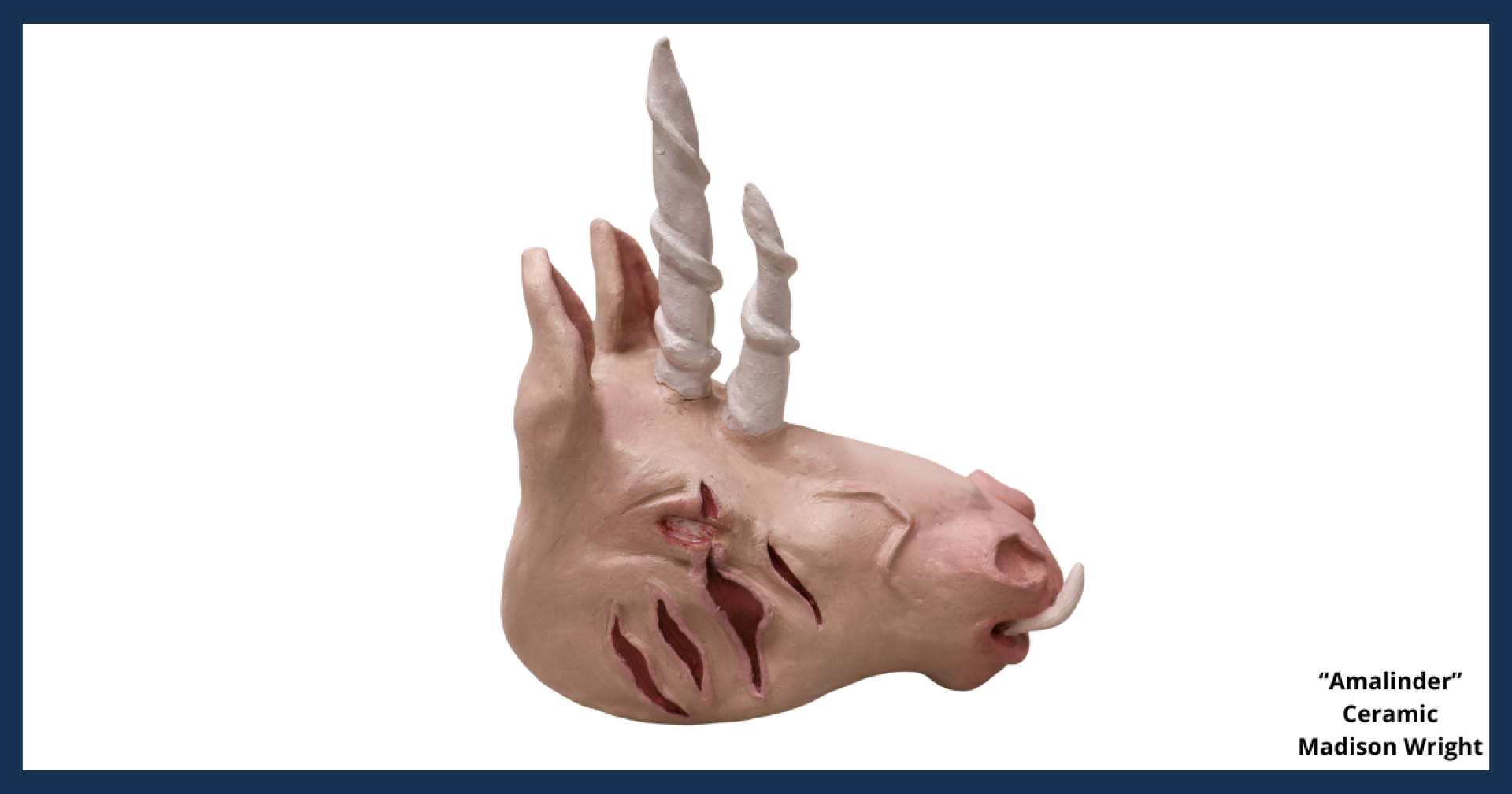 A ceramic sculpture of a pink unicorn-looking head with two horns, titled "Amalinder," created by Madison Wright.