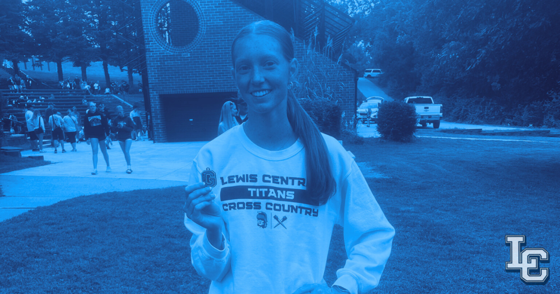 Madelyn Hoss with a cross country medal