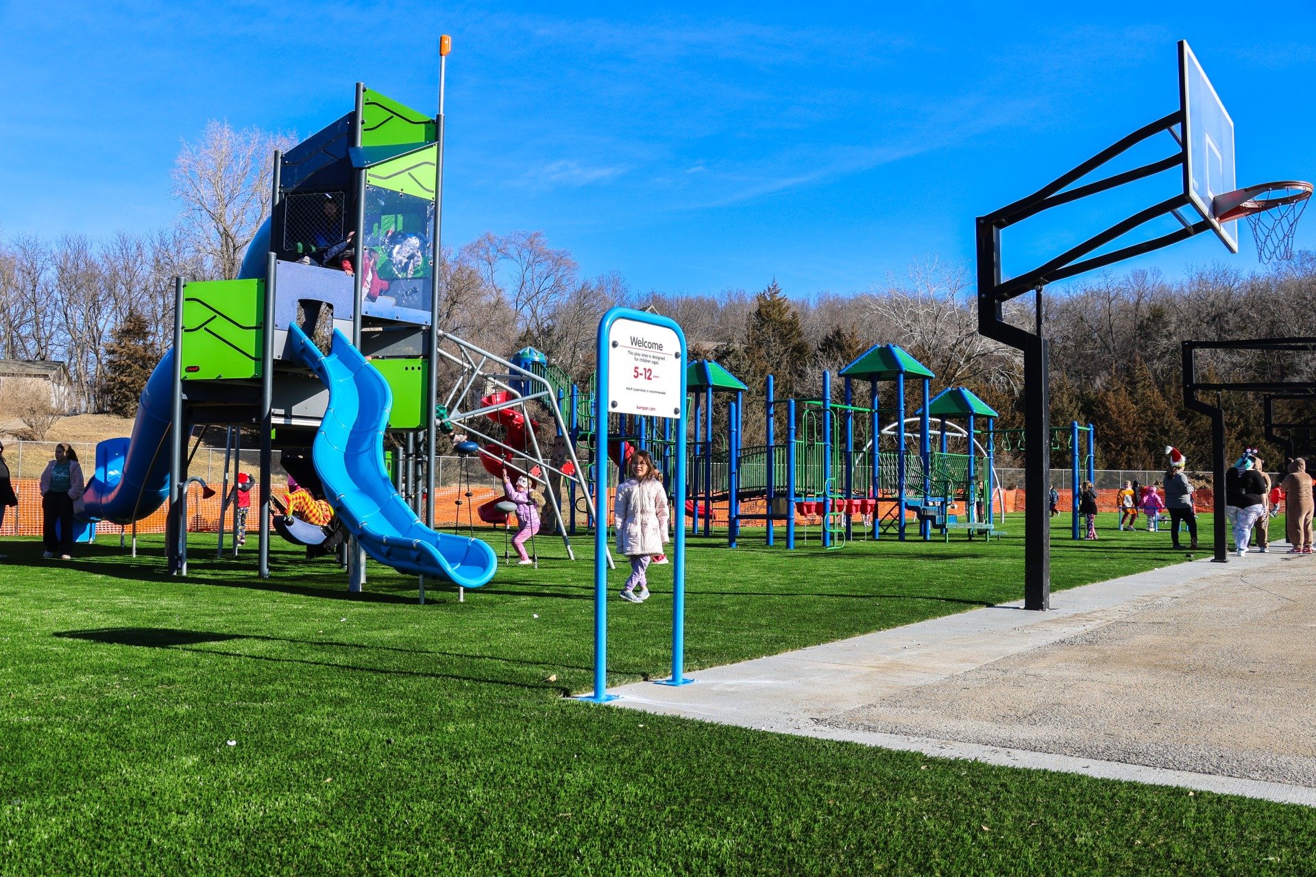 The new playground equipment and turf surfacing.
