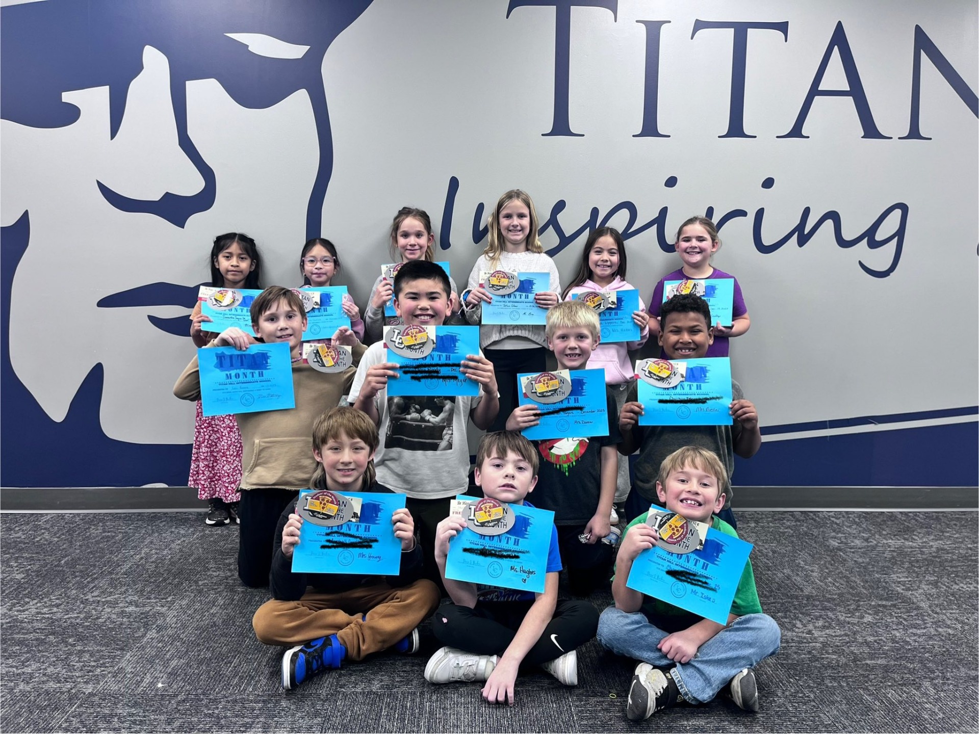 A group of students who were named the Titan of the Month.