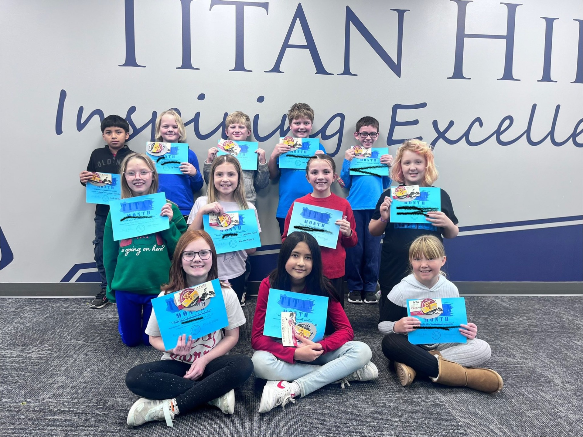 A group of students who were named the "Titan of the Month".