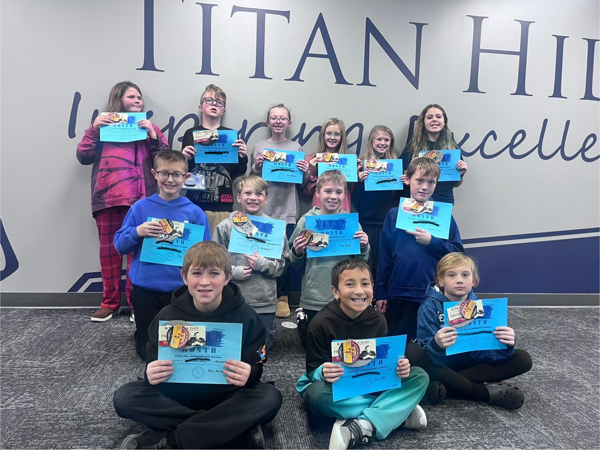 A group of students who were named the Titan of the Month.
