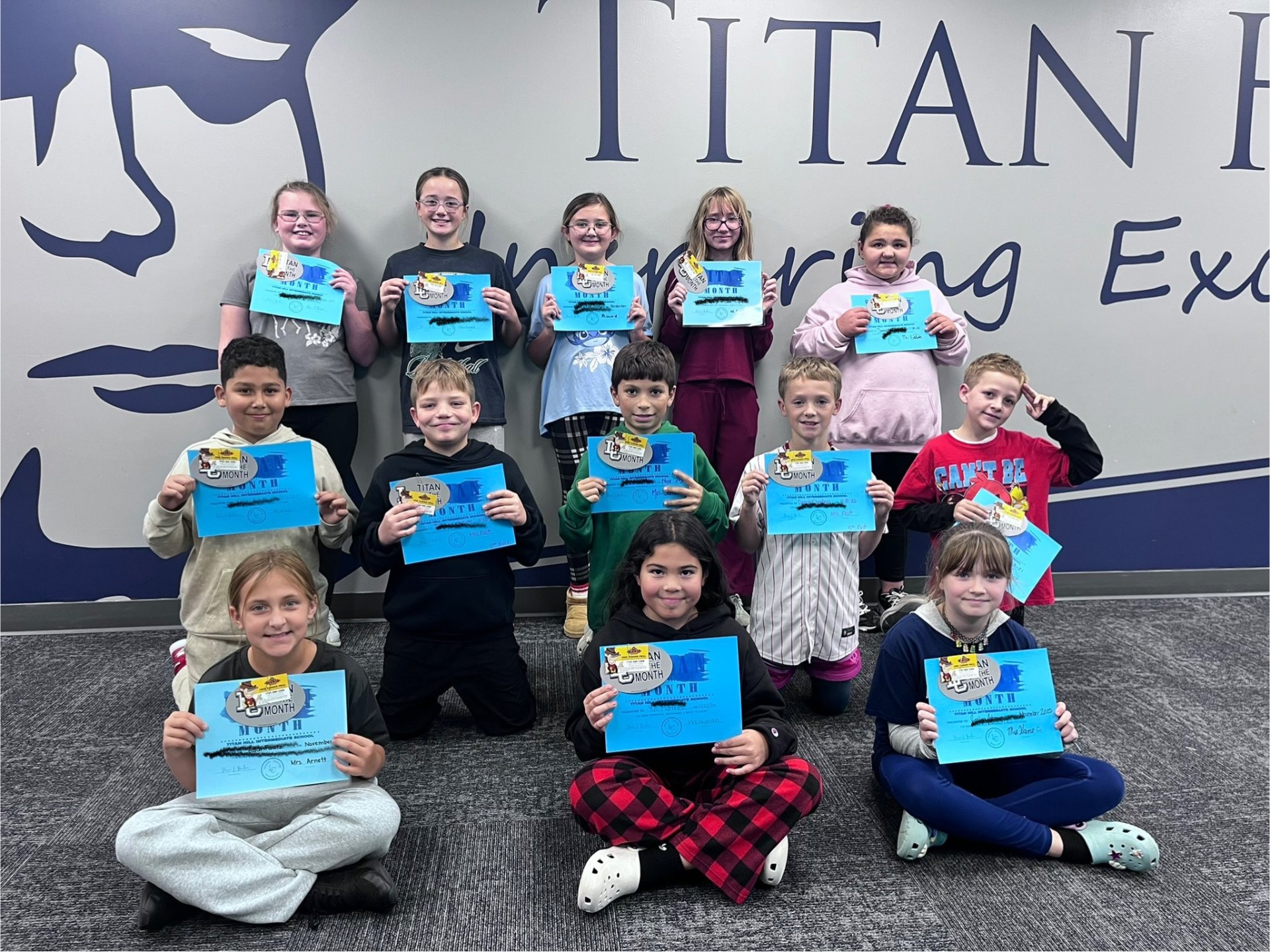 A group of students who were named the Titan of the Month.