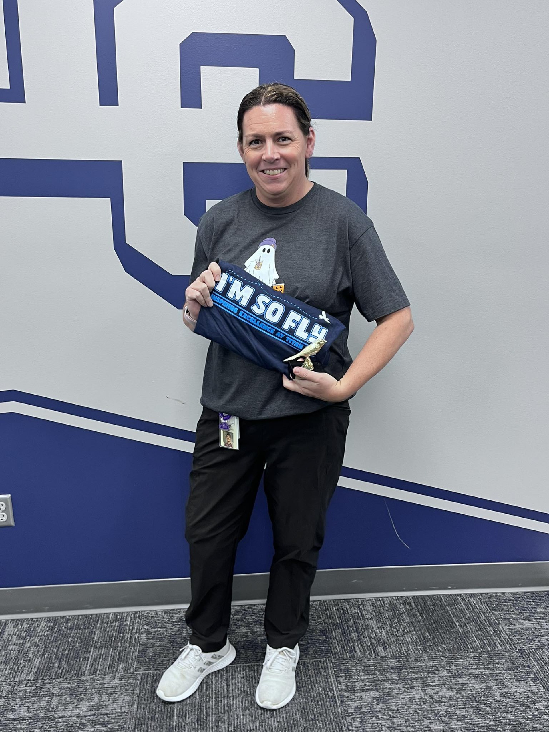 Mrs Miller with her "Youre so Fly" award.